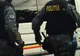 Polițist din Timișoara, suspectat că ajuta o grupare de hoți. Descinderi în județul Timiș