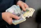 Lovitură pentru sute de mii de bugetari. Noua lege le îngheață salariile, în timp ce veniturile demnitarilor cresc etapizat